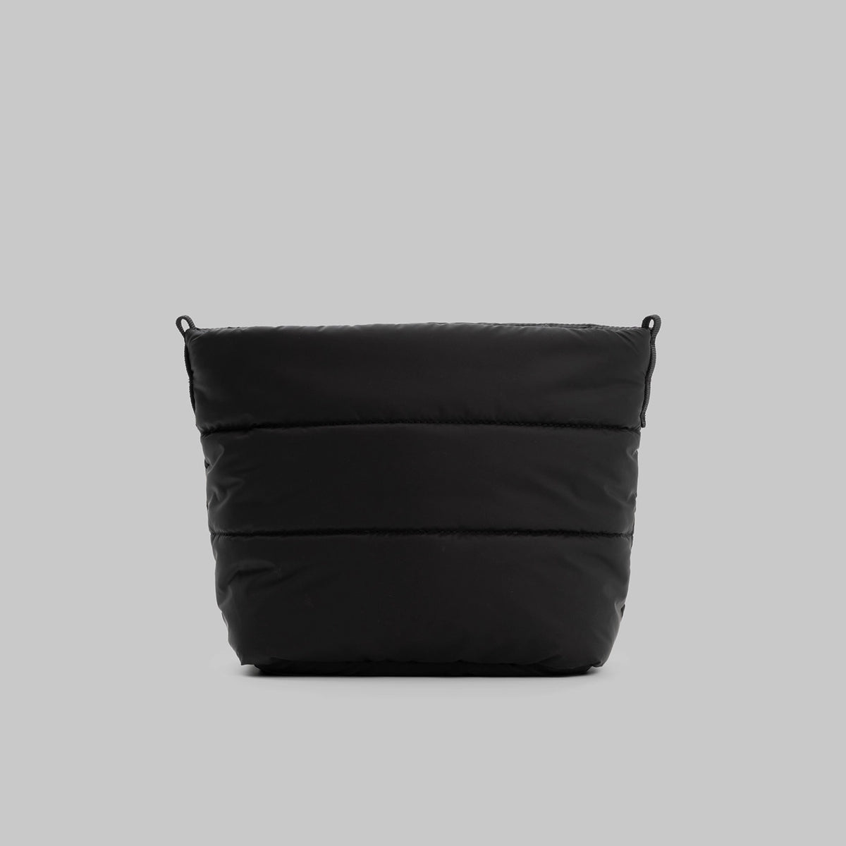 Besace Black Silky Peach Bag, a lightweight sling bag with zipper closure and recycled nylon for daily accessories.