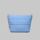 Besace Chambray Silky Peach Bag in soft blue, lightweight sling bag with zipper closure and spacious compartments.