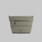 Besace Moss Silky Peach Bag, lightweight sling bag with zipper closure and compartments, made of recycled nylon.