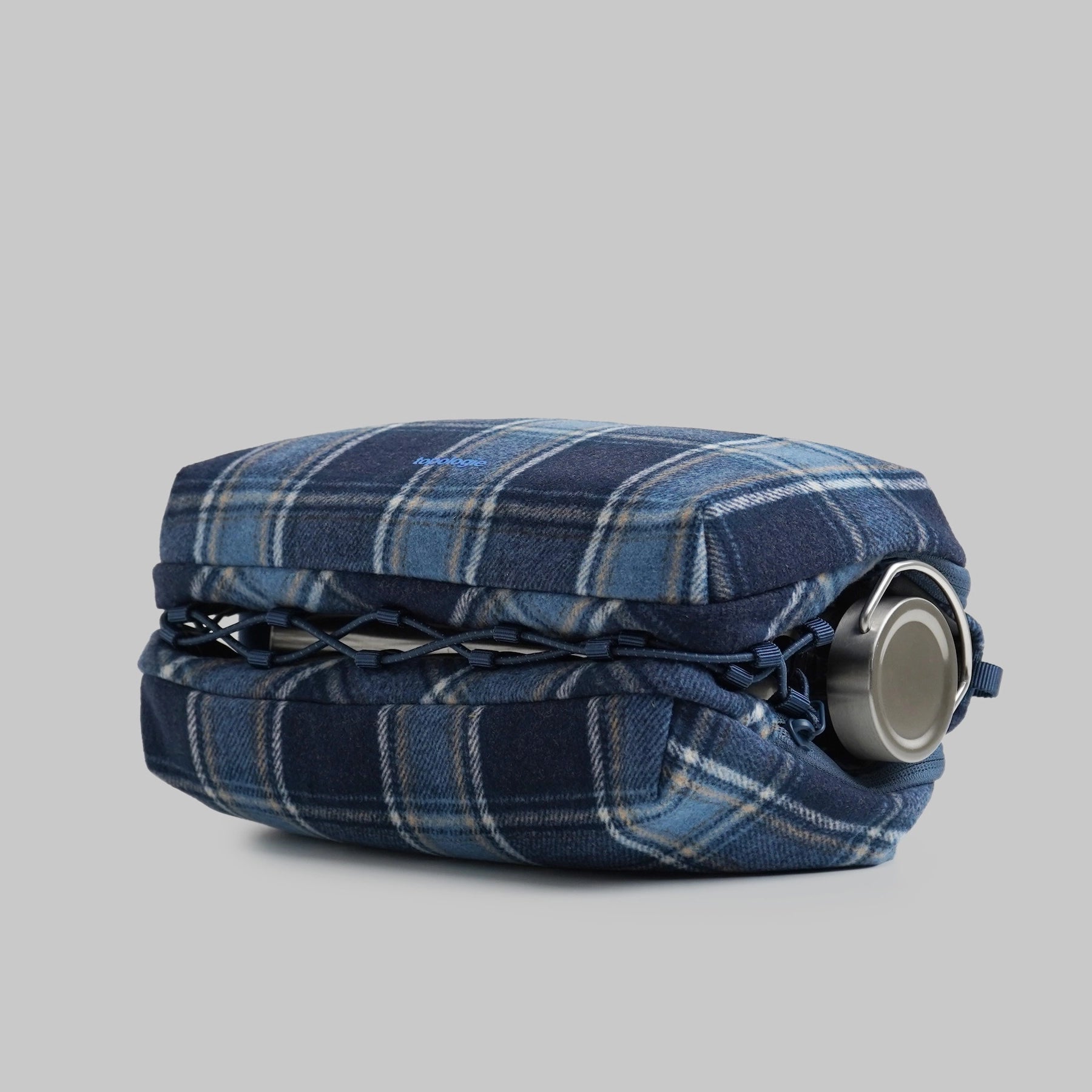 Bottle Sacoche Large Blue Check Wool Bag with water repellent fabric and elastic cord for secure bottle placement.
