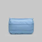 Bottle Sacoche Large Chambray Silky Peach Bag in light blue with puffy design and Topologie logo.