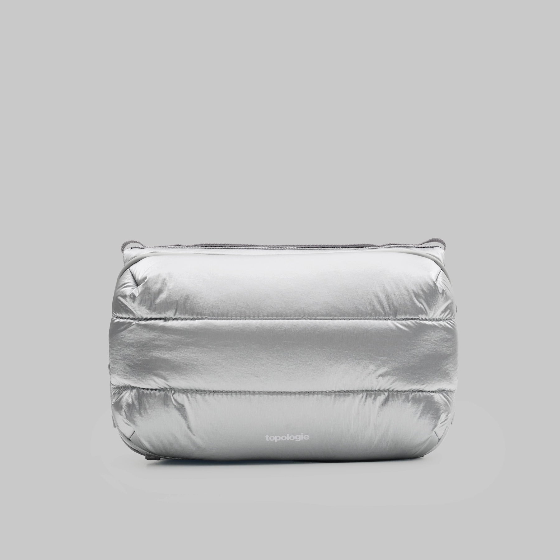 Bottle Sacoche Large Chrome Space Coated Bag in shiny silver, a stylish and functional accessory.