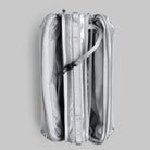 Bottle Sacoche Large Chrome Space Coated Bag folded view with zipped compartments and sleek design.