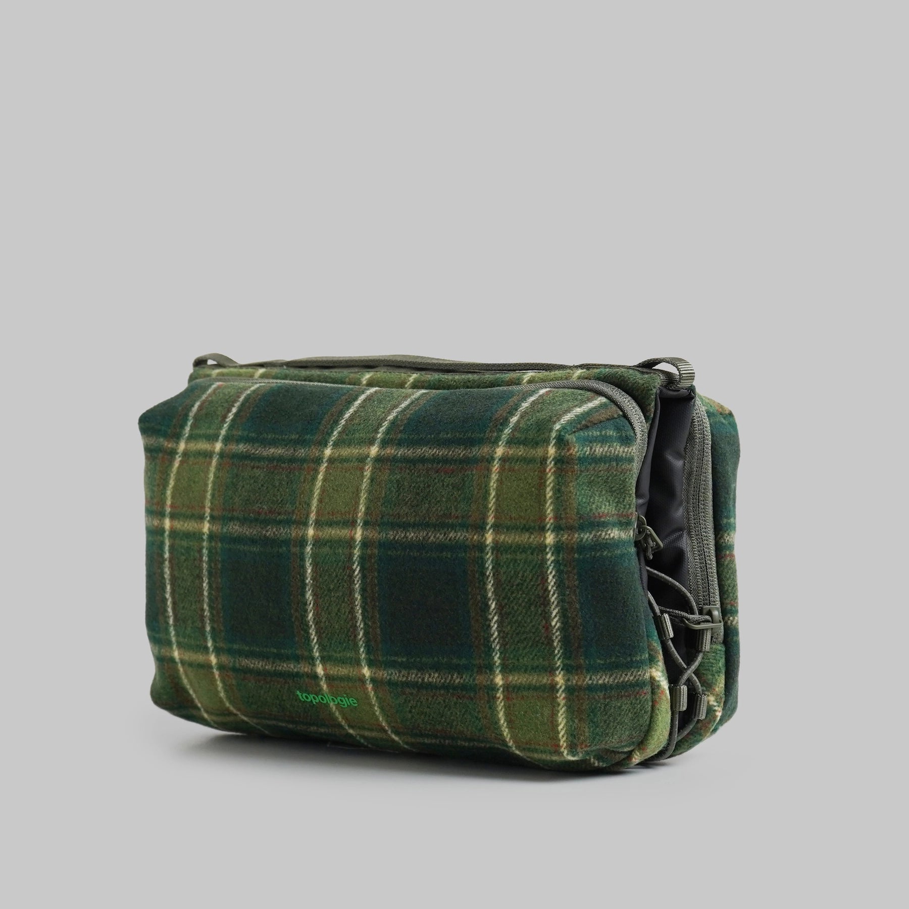 Bottle Sacoche Large Green Check Wool Bag in green plaid pattern with water repellent fabric.