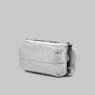 Bottle Sacoche Medium Chrome Space Coated Bag showcasing its sleek, water repellent design.