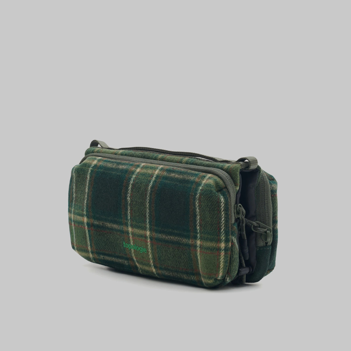 Bottle Sacoche Medium Green Check Wool Bag in a stylish plaid design with two zipped compartments.