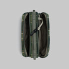 Bottle Sacoche Medium Green Check Wool Bag open showing two main zipped compartments and internal pockets.