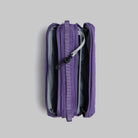 Bottle Sacoche Medium Purple Washed Silk Nylon Bag showing purple exterior and zipped compartments.