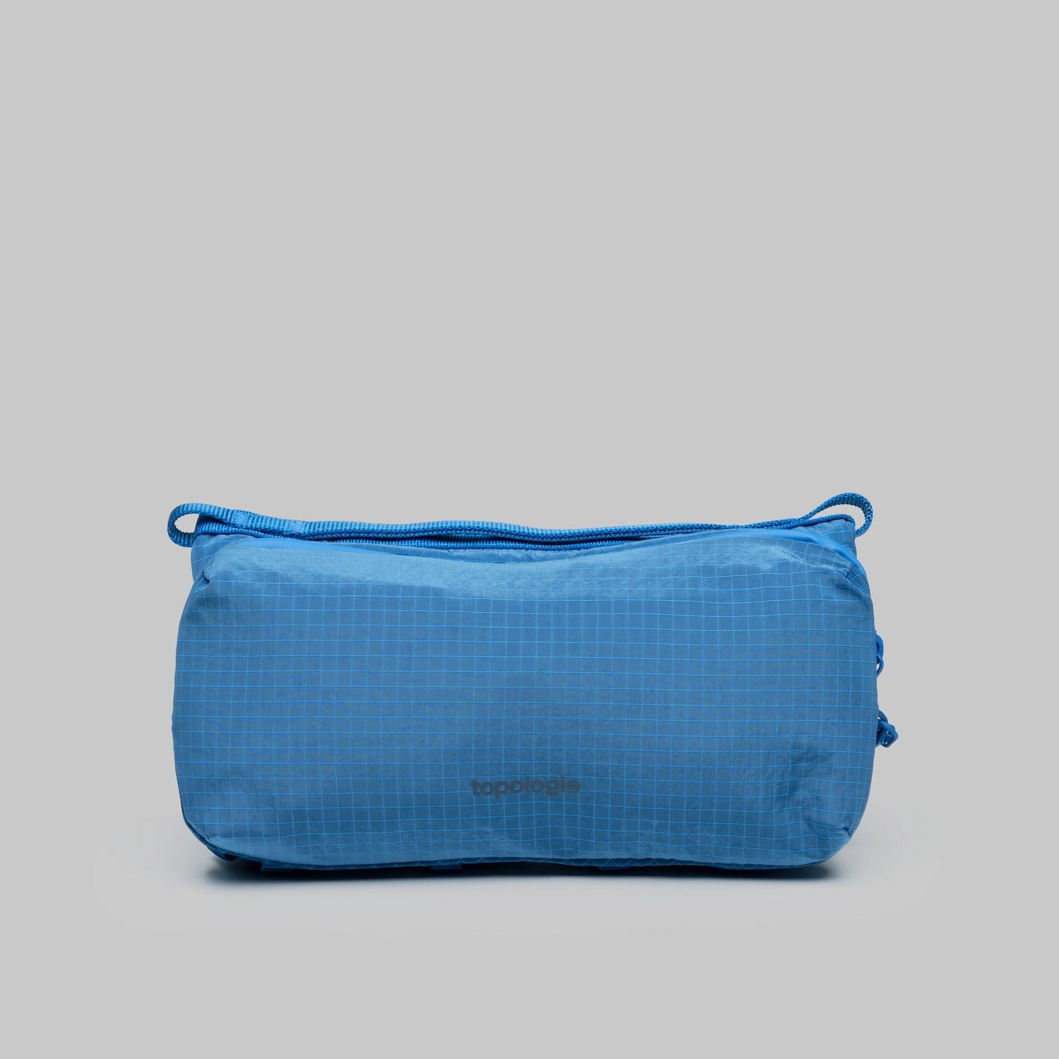 Bottle Sacoche Medium Sonic Vintage Ripstop Bag in blue with zippered compartments and water repellent fabric.