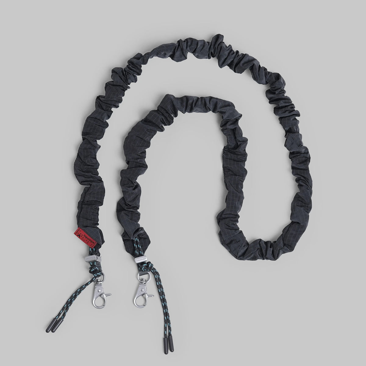 Bungee Strap Burn Ash Vintage Ripstop with adjustable length and quick release clasps.