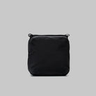 Cassette Sacoche Medium Black Tech Sateen Bag front view, water-resistant fabric, versatile carrying options.
