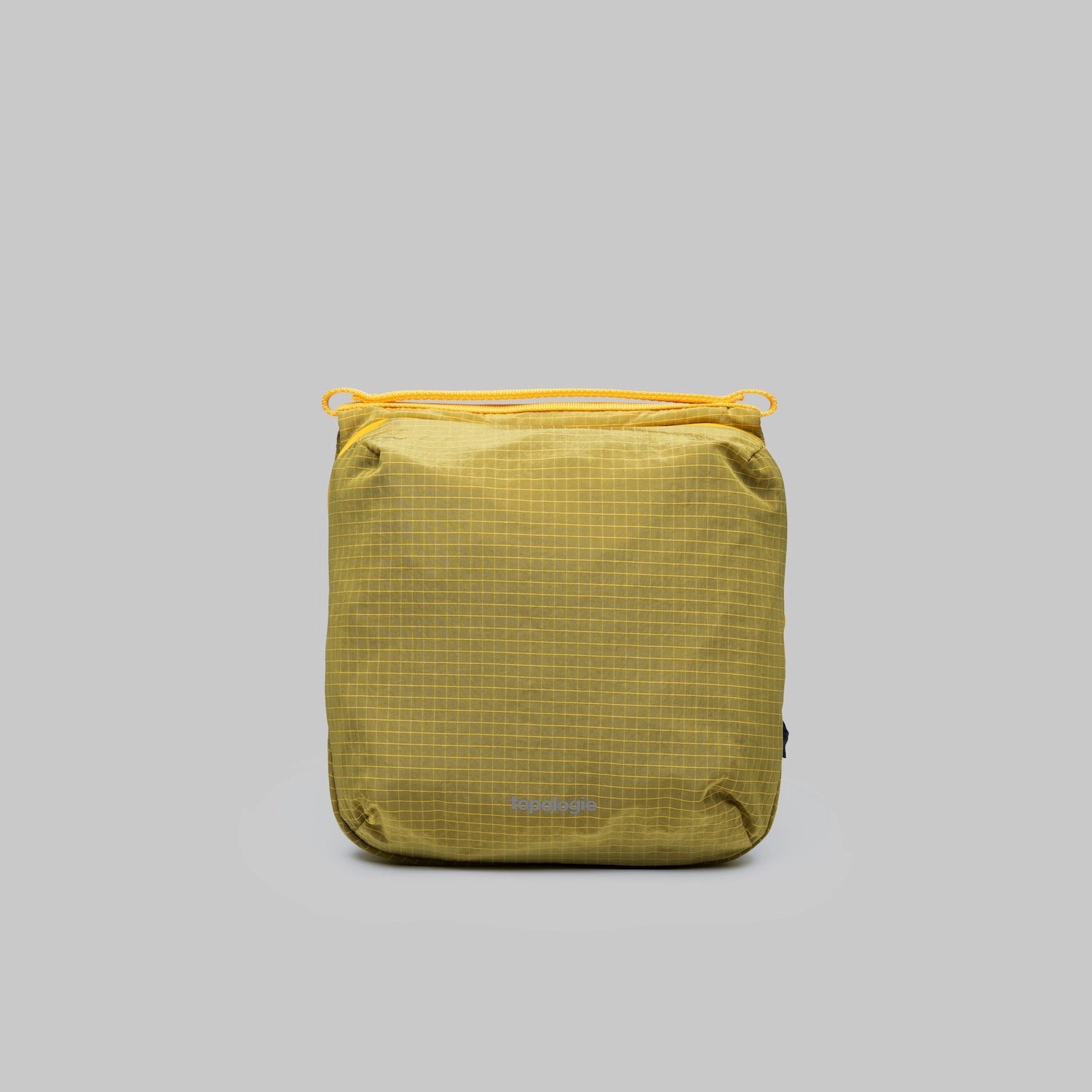 Cassette Sacoche Medium Mustard Vintage Ripstop Bag in a vibrant mustard color, featuring a grid pattern.