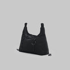 Cloud Hobo XS Black Tech Sateen Shoulder Bag side view on a light gray background