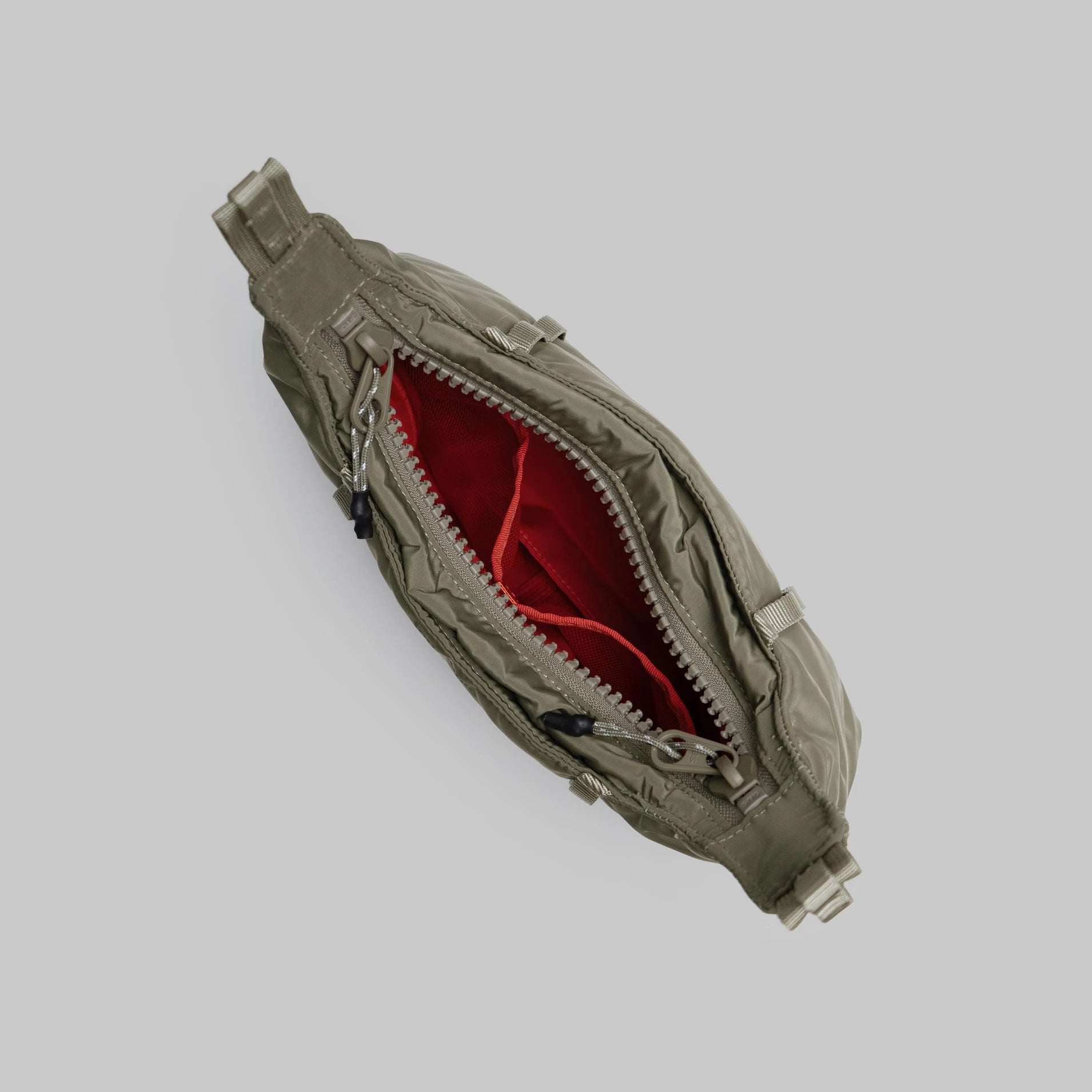 Cloud Hobo XS Moss Tech Sateen Shoulder Bag open top view showing red interior and zipped compartment.