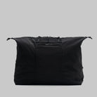 Explorer Tote Weekender Black Tech Sateen Shoulder Bag displayed in a sleek design with a zippered closure.