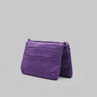 Flat Sacoche Small Purple Washed Silk Nylon Bag showcasing its waterproof fabric and three zipped compartments.