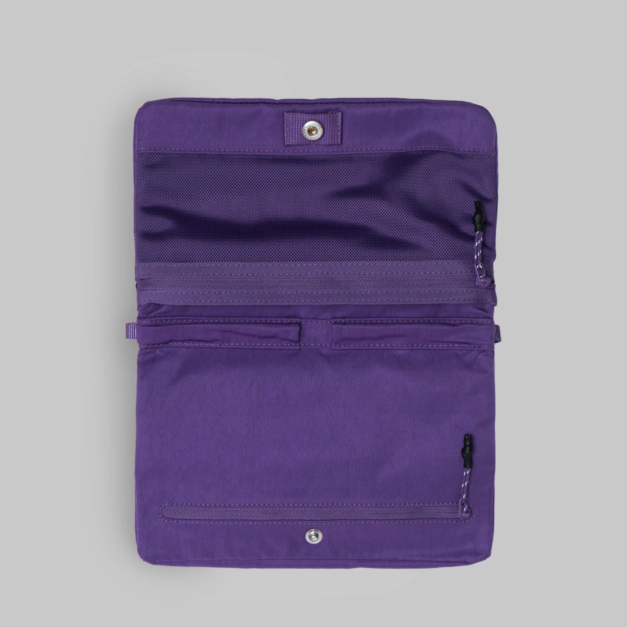 Flat Sacoche Small Purple Washed Silk Nylon Bag interior view with zipped compartments and water repellent fabric.