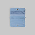 Phone Sacoche 90 Chambray Silky Peach Bag interior with multiple zipped compartments in light blue color.