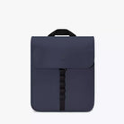 Kumo Medium Lotus Infinity Dark Navy Backpack with durable, scratch resistant material and magnetic closure features.