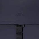 Close-up of Kumo Medium Lotus Infinity Dark Navy Backpack showing logo detail and strap.