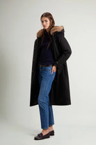 Best Cotton Faux Fur Parka Black Coat worn by model, showcasing stylish faux fur hood and sleek design.