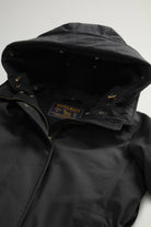 Best Cotton Faux Fur Parka Black Coat interior view with adjustable hood and Woolrich logo.