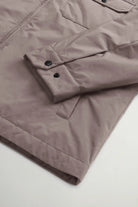 Cloud Overshirt Falcon by Woolrich, featuring a close-up of the sleeve with snap button details.