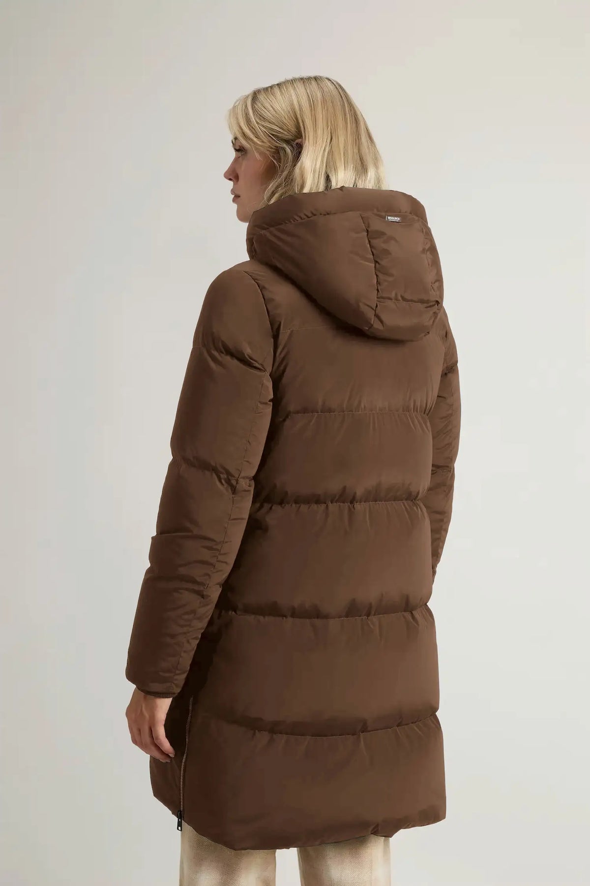 Kelly Jacket Dark Earth Coat by Woolrich, showcasing a stylish and warm down-filled design.