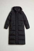 Kelly Long Parka Black Coat featuring a premium down fill and adjustable hood, designed for warmth and style.