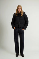 Model wearing a Madison Jacket Black Coat, showcasing its stylish design and premium down filling.