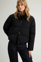 Madison Jacket Black Coat worn by a model, featuring a stylish design and down-filled warmth.