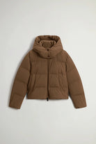 Madison Jacket Dark Earth Coat by Woolrich in premium down filling, windproof, and water-repellent with removable hood.