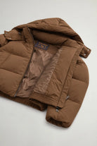 Madison Jacket Dark Earth Coat interior view showcasing Woolrich branding and premium down filling.
