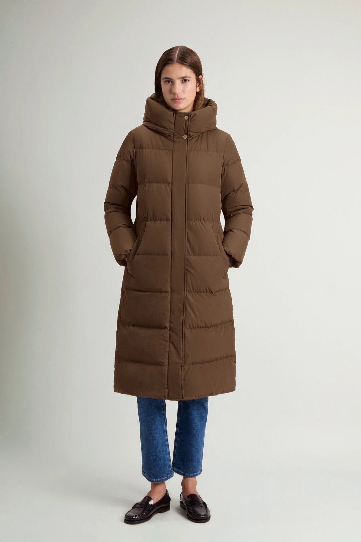 Madison Long Coat Dark Earth Coat by Woolrich, featuring a warm and stylish down-filled design, perfect for winter.