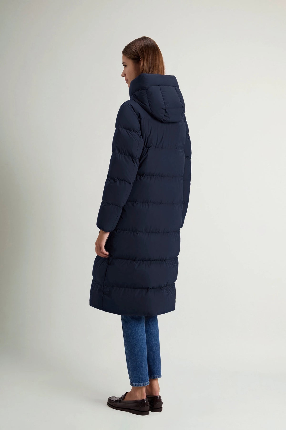 Woolrich Madison Long Coat Melton Blue Coat, a premium down filled coat viewed from the back.
