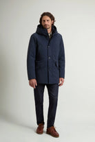 Stretch Parka Melton Blue Coat worn by a model, showcasing its stylish and functional design.