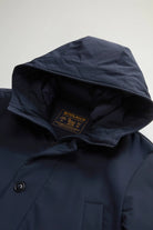 Stretch Parka Melton Blue Coat with adjustable hood and button closure from Woolrich.