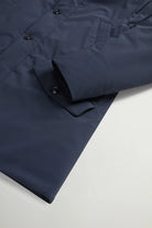 Stretch Parka Melton Blue Coat showing the premium fabric and button details.