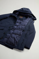 Stretch Parka Melton Blue Coat displayed with open front and adjustable hood, showcasing premium padding and two-way zipper.