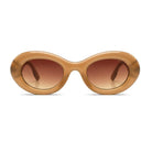 Molly Sahara Sunglasses with gradient brown lenses and eco-made bio nylon frame for UV protection.