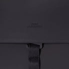 Kumo Medium Lotus Infinity Black Backpack detail showing material and magnetic closure.